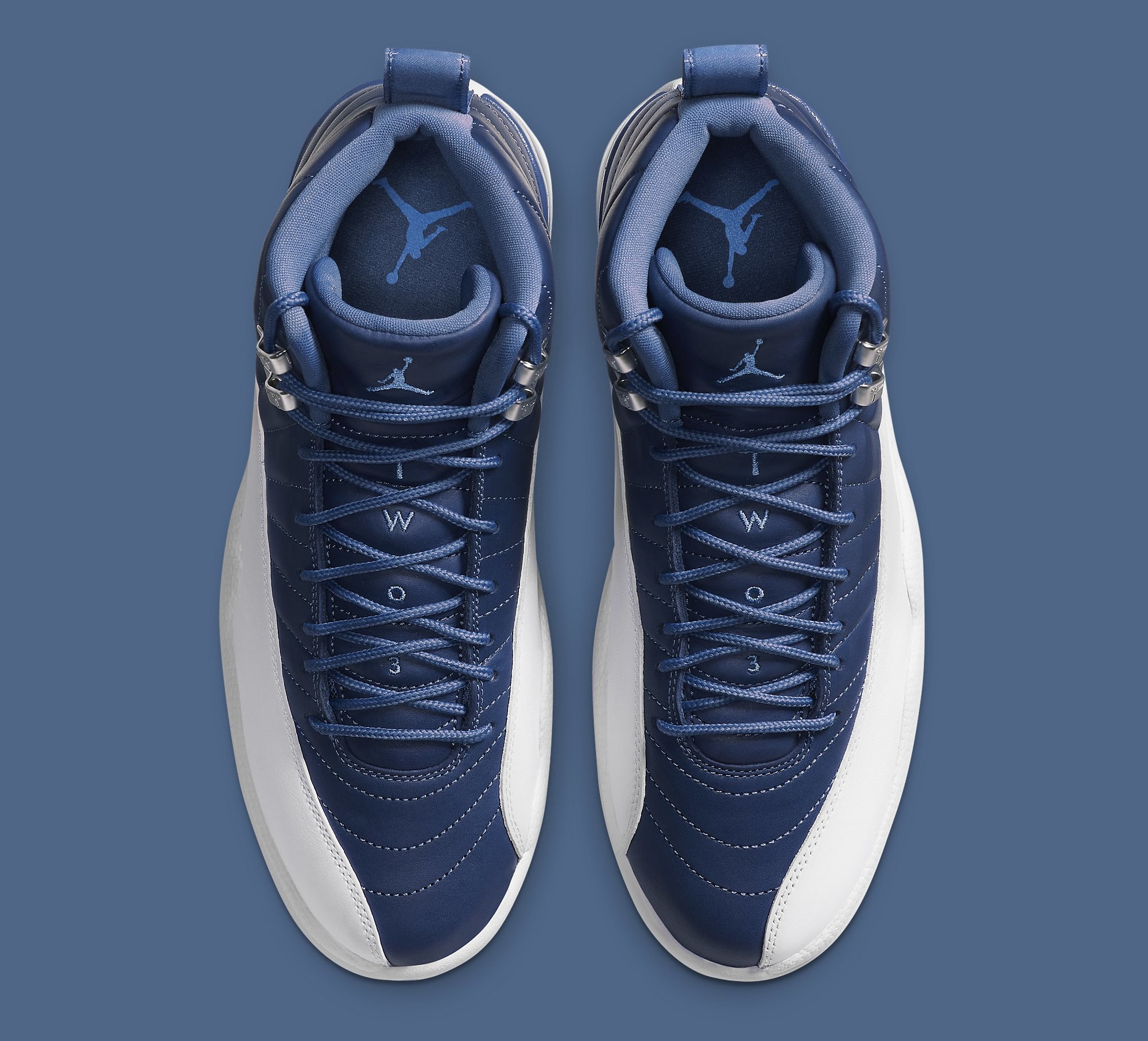 blue and white jordan 12 indigo