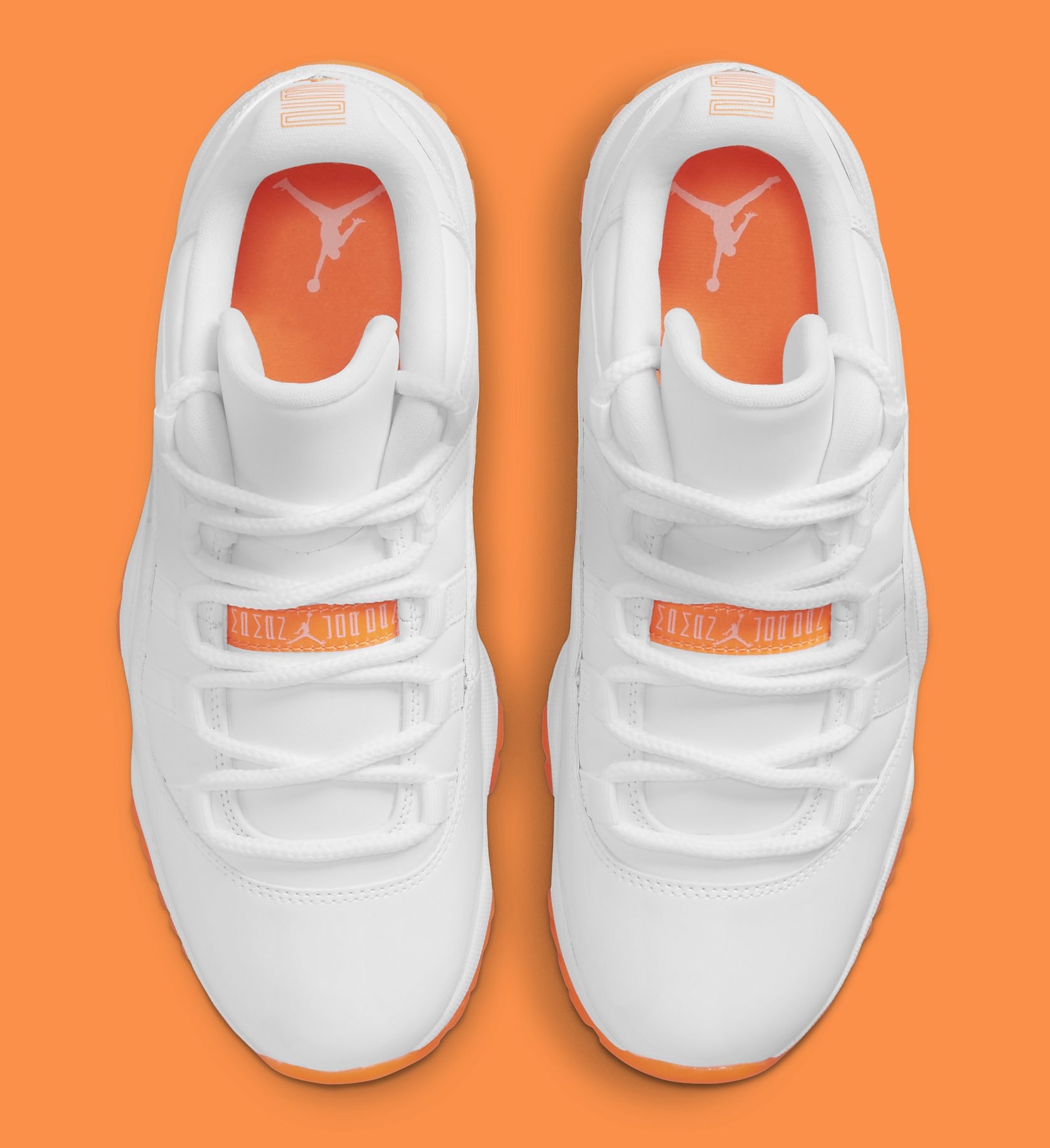 orange and white jordan 11