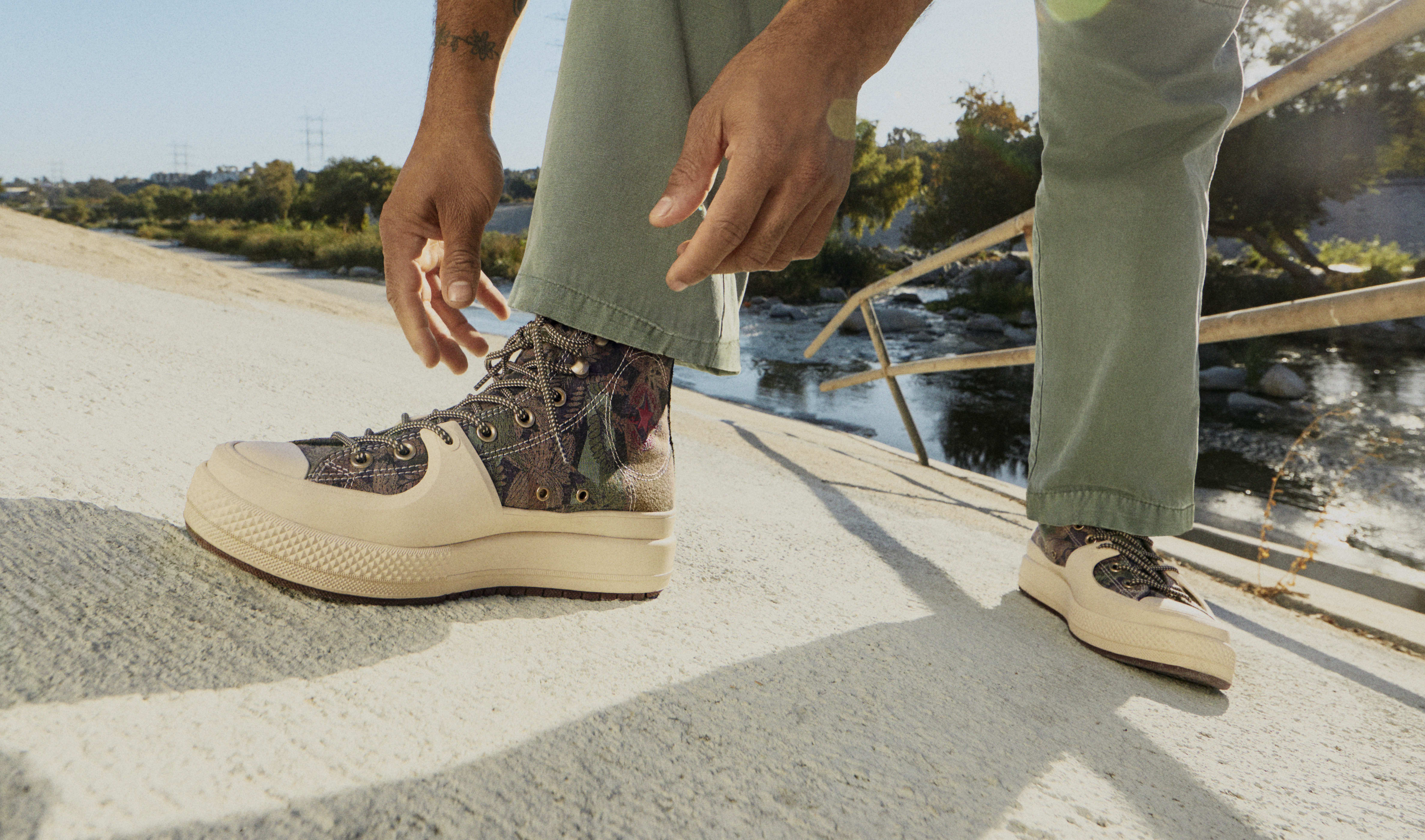 white converse with black stripe