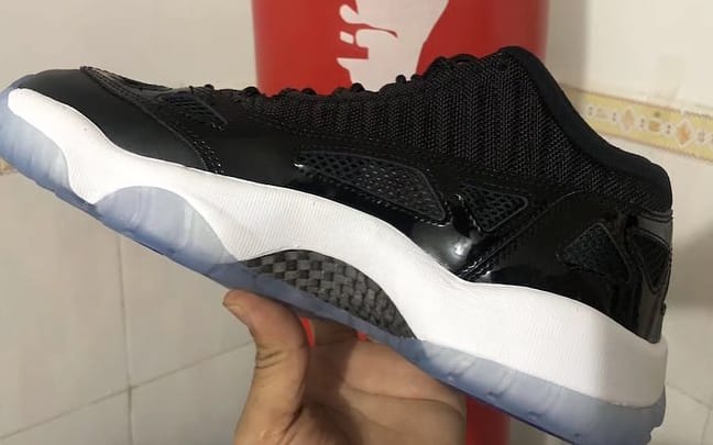 Jordan 11 space jam carbon fiber deals