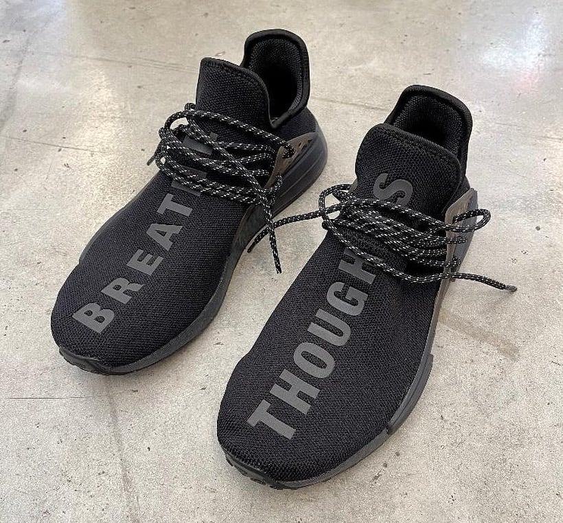 triple black nmd human race