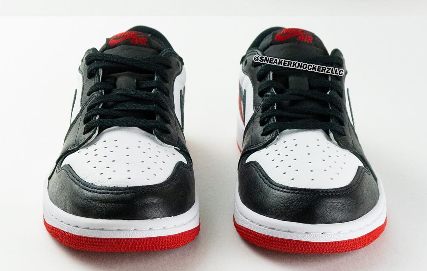 nike jordan low black toe
