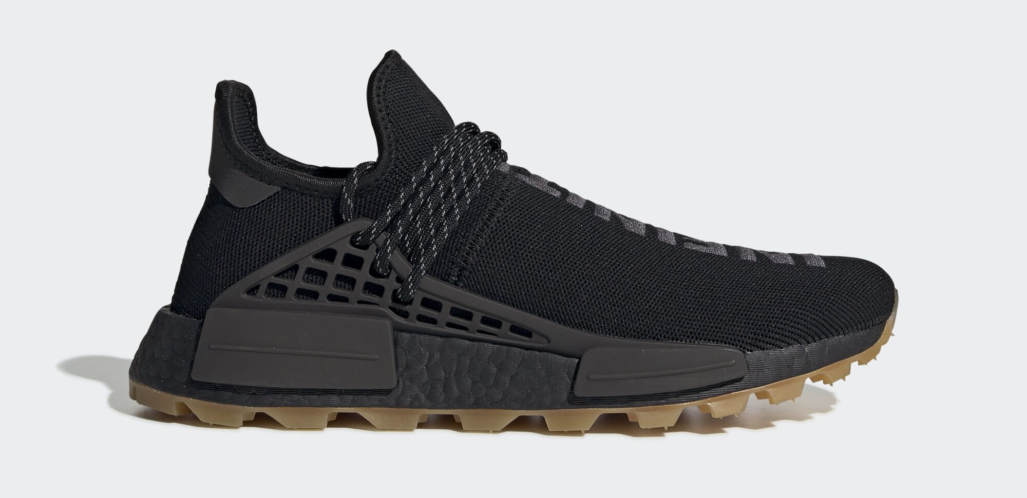 human race nmd black gum sole