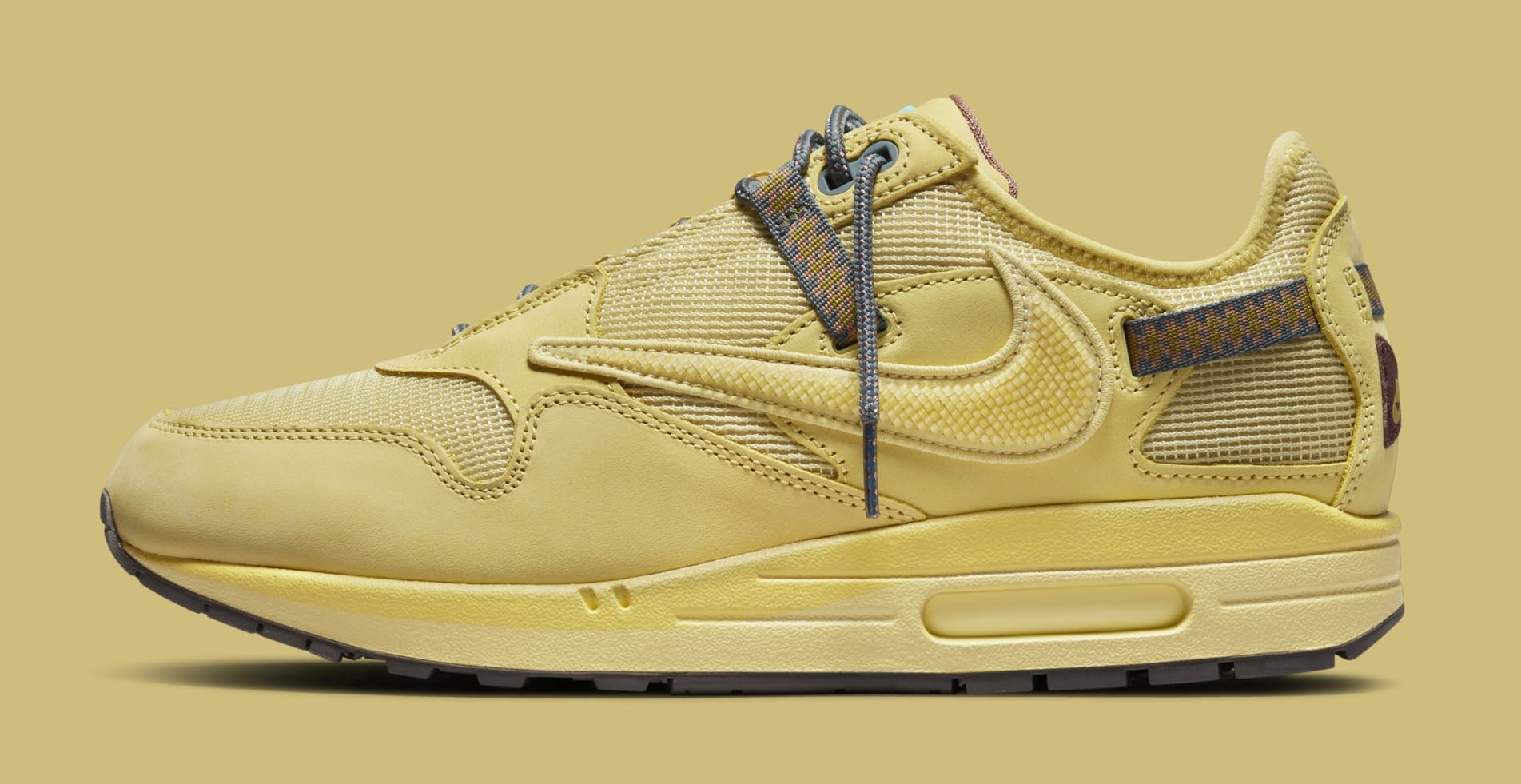 travis air max 1 gold