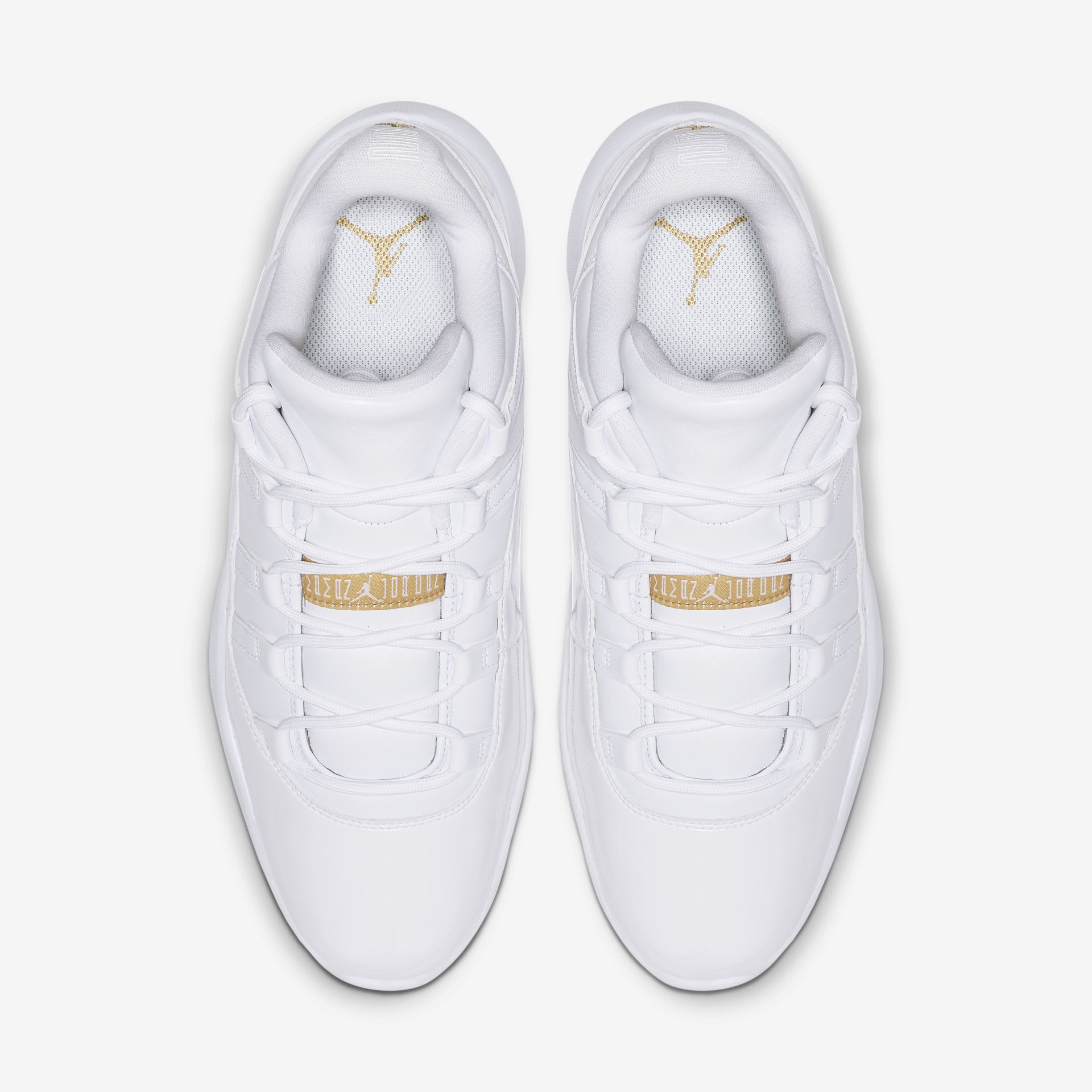 gold and white jordan 11 low