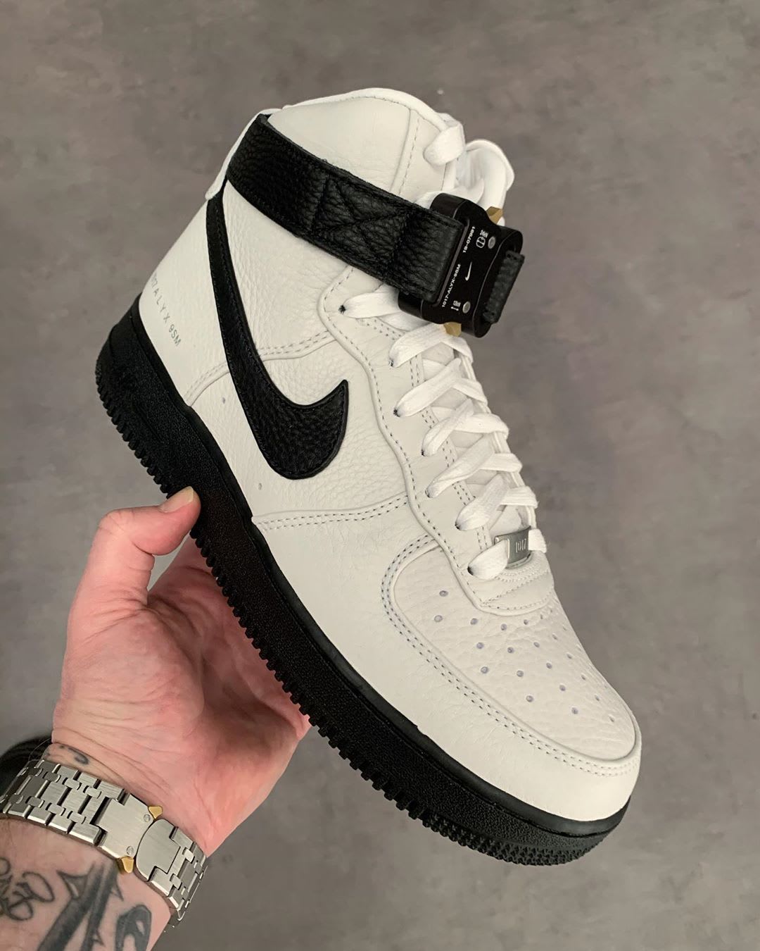 nike air force 1 high top with strap on back