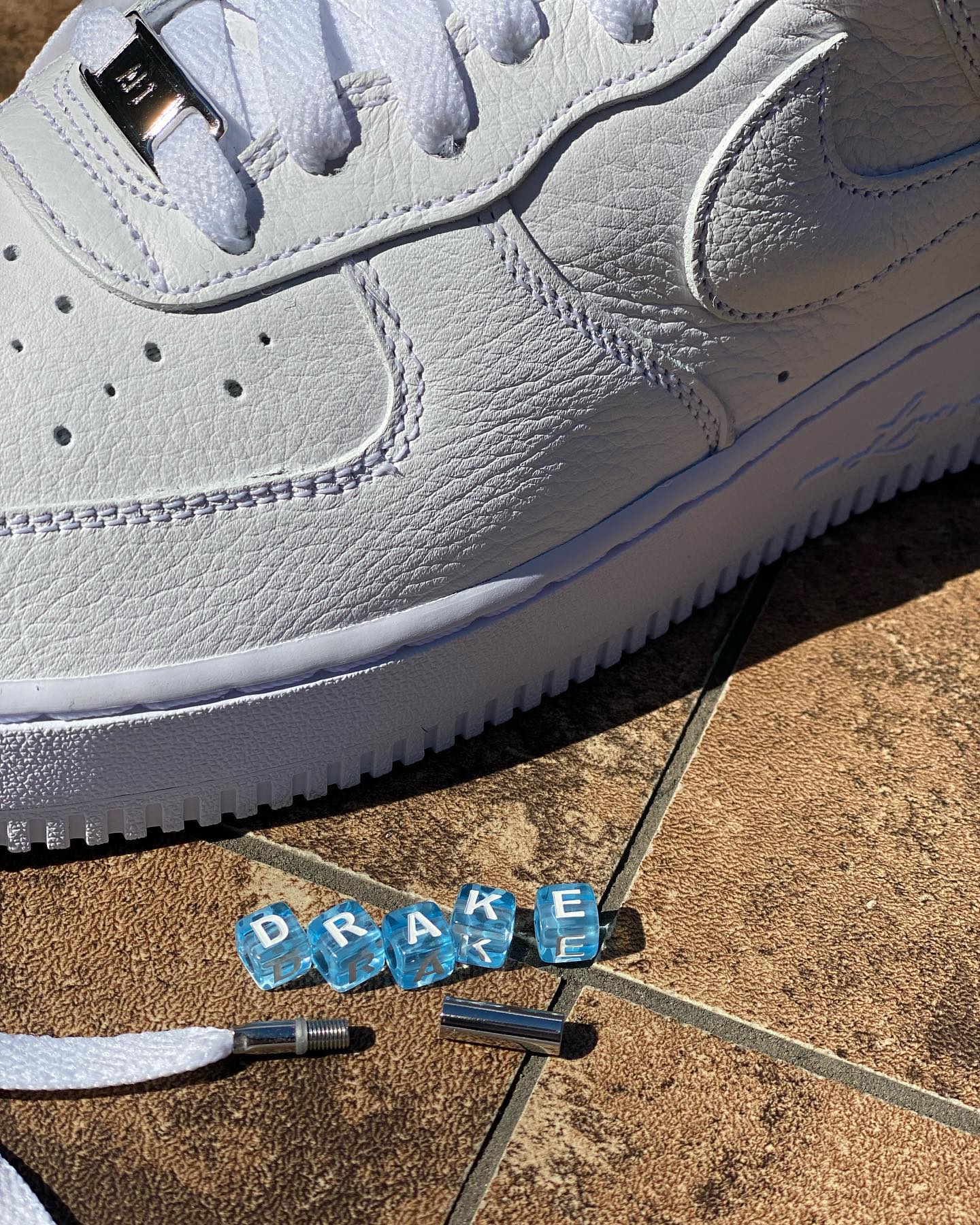 Nocta x Nike Air Force 1 Low Aglets