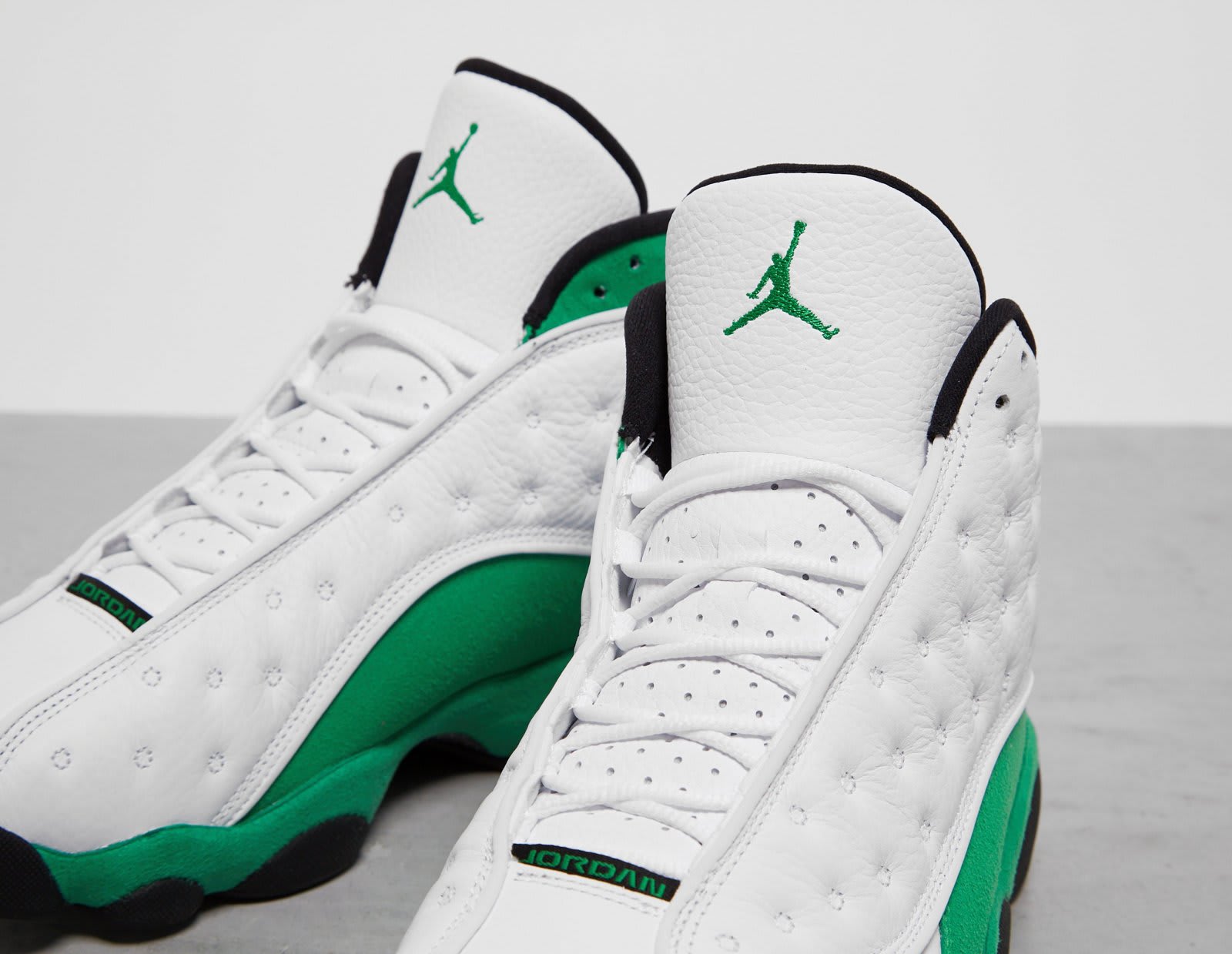 green and white jordan 13s