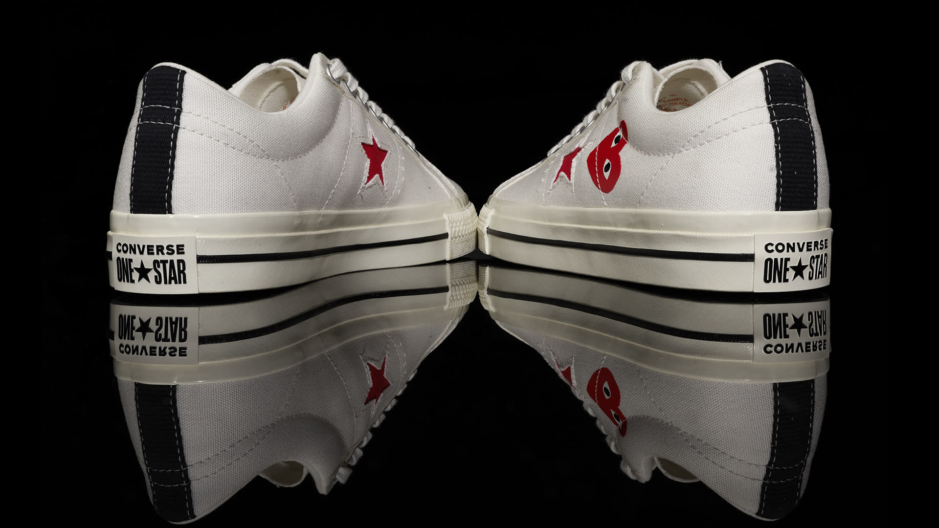 navy comme des garcons converse