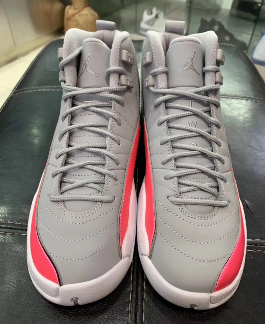 pink and grey jordan 12s