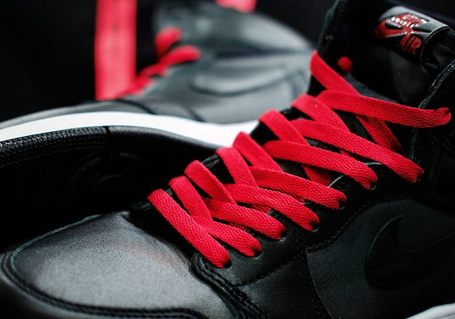 black jordan 1 red laces